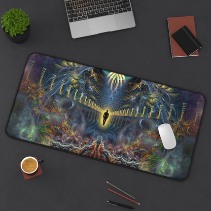 The "Heightened Stroll" desk mat on a dark desk with a laptop, notebook and coffee cup.