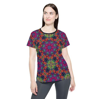 Close-up of the Lucid Dream sport tee print showing color and pattern detail.