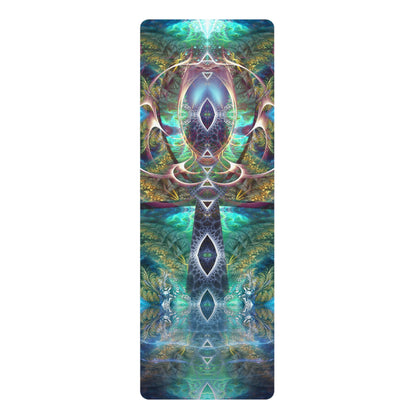 Full length view of the Fleur De Vie yoga mat's teal, gold, and white ornate print on a wood floor.