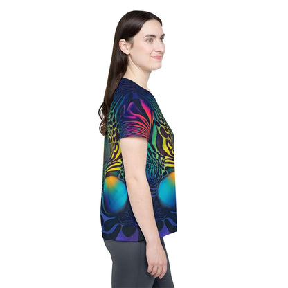 Side view of the Cosmic Fingerprint women's sport tee on a flat surface.