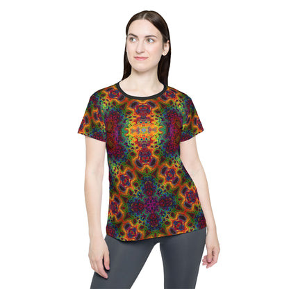 Close-up of the Lysergic Burst print on the women's sport tee fabric.