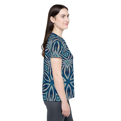 Folded view of the "Ice Chant" women's sport tee showing the printed design.