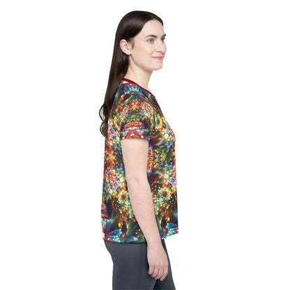 Close-up of the fabric texture on the "Kaleidobloom" print women's sport tee.