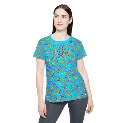 Close-up of the Loco Motion sport tee print showing color and pattern detail.