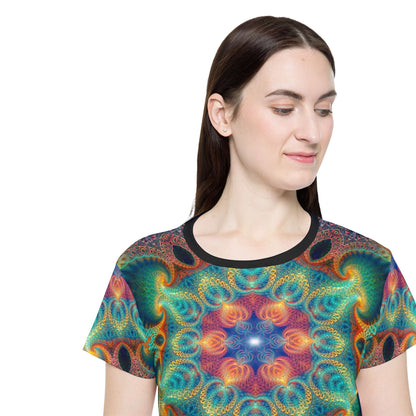 Folded view of the women's sport tee printed with the Free Your Mind design.