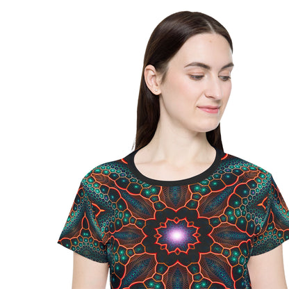 Corner detail of the Multiverse print near the hem of the sport tee.