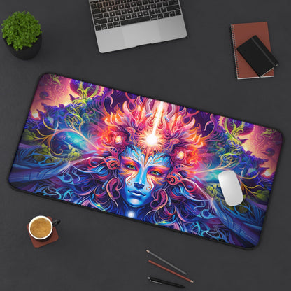 The Sacred Vine Face Section desk mat laid on a desk beside a keyboard and mouse.