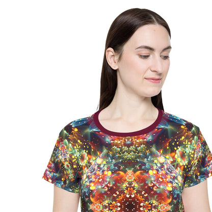 Full pattern view of the "Kaleidobloom" print women's sport tee.