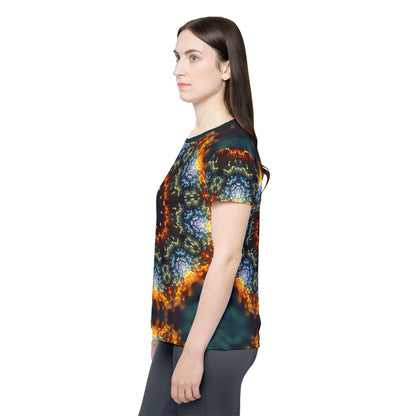 Flat lay of the women's sport tee showing the Fractal Flower Mandala print.