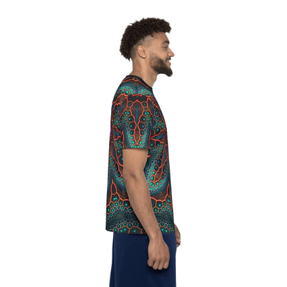 Corner detail of the Multiverse print near the hem of the sport tee.