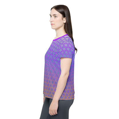 Women's sport tee in the Flower de Life V2 sacred geometry all-over print design, shown from above.