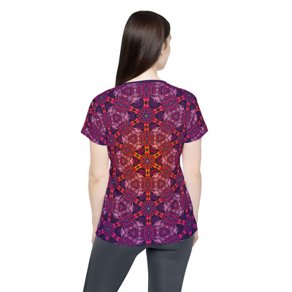 Corner detail of the "Forged In Neon" all-over print on the women's sport tee.