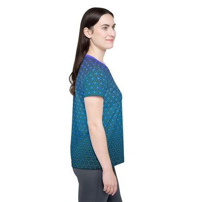 Detail shot of the Blue Flower of Life Pattern design on the women's sport tee