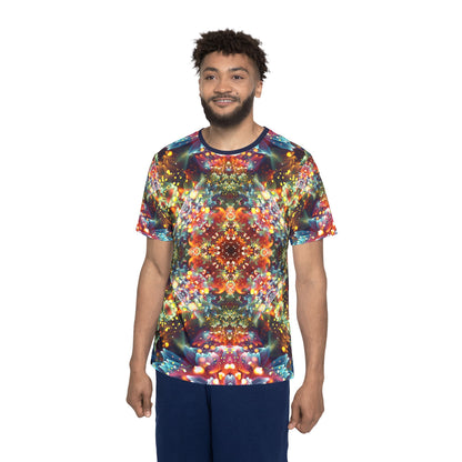 Corner detail of the "Kaleidobloom" print men's sport tee.