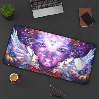 Lapis Philosophorum desk mat laid on a desk with a keyboard and mouse