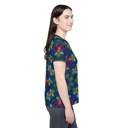 Side view of the Cosmic Fingerprint V2 women's sport tee on a flat surface.