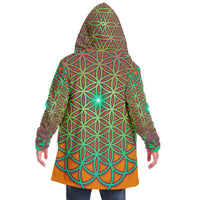 Back view of a model wearing the '311 FOL' hooded cloak.