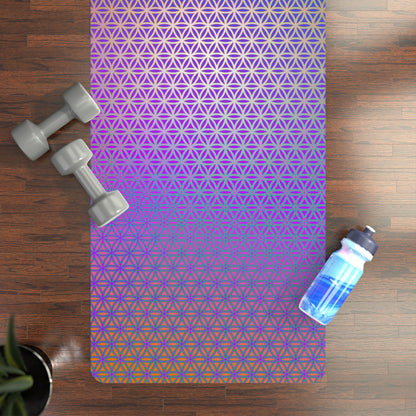Angled view of the Flower de Life yoga mat resting on a floor.
