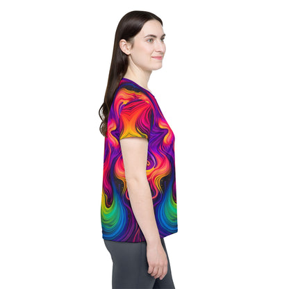 Side view of the Cosmic Currents women's sport tee on a flat surface.