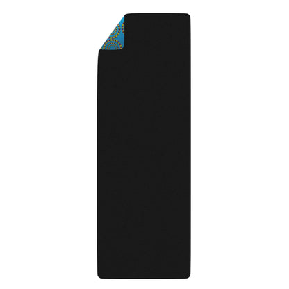Corner view of the Loco Motion yoga mat showing the natural rubber bottom edge
