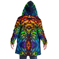 Model wearing the Scaled hooded cloak, back view showing the dragon scale print.