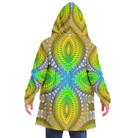 Back view of a man wearing the Activation Initiated hooded cloak with the hood up over a green and blue fractal print.