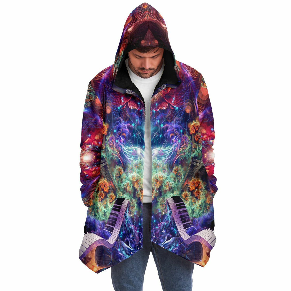 Male model wearing the "Magnus Opum" hooded cloak, facing forward with the design visible across the chest.