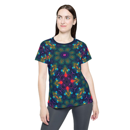 Close-up of the Cosmic Fingerprint V2 print detail on the sport tee fabric.