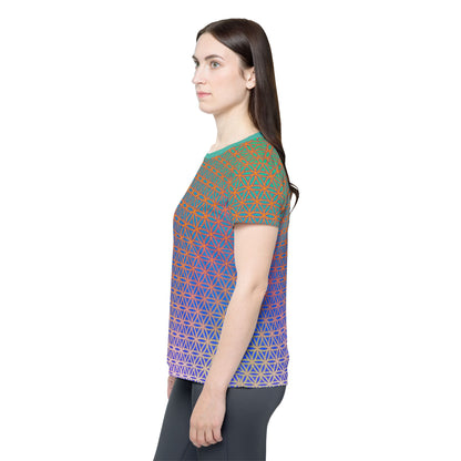 Women's sport tee in the Flower de Life sacred geometry all-over print design, shown from above.