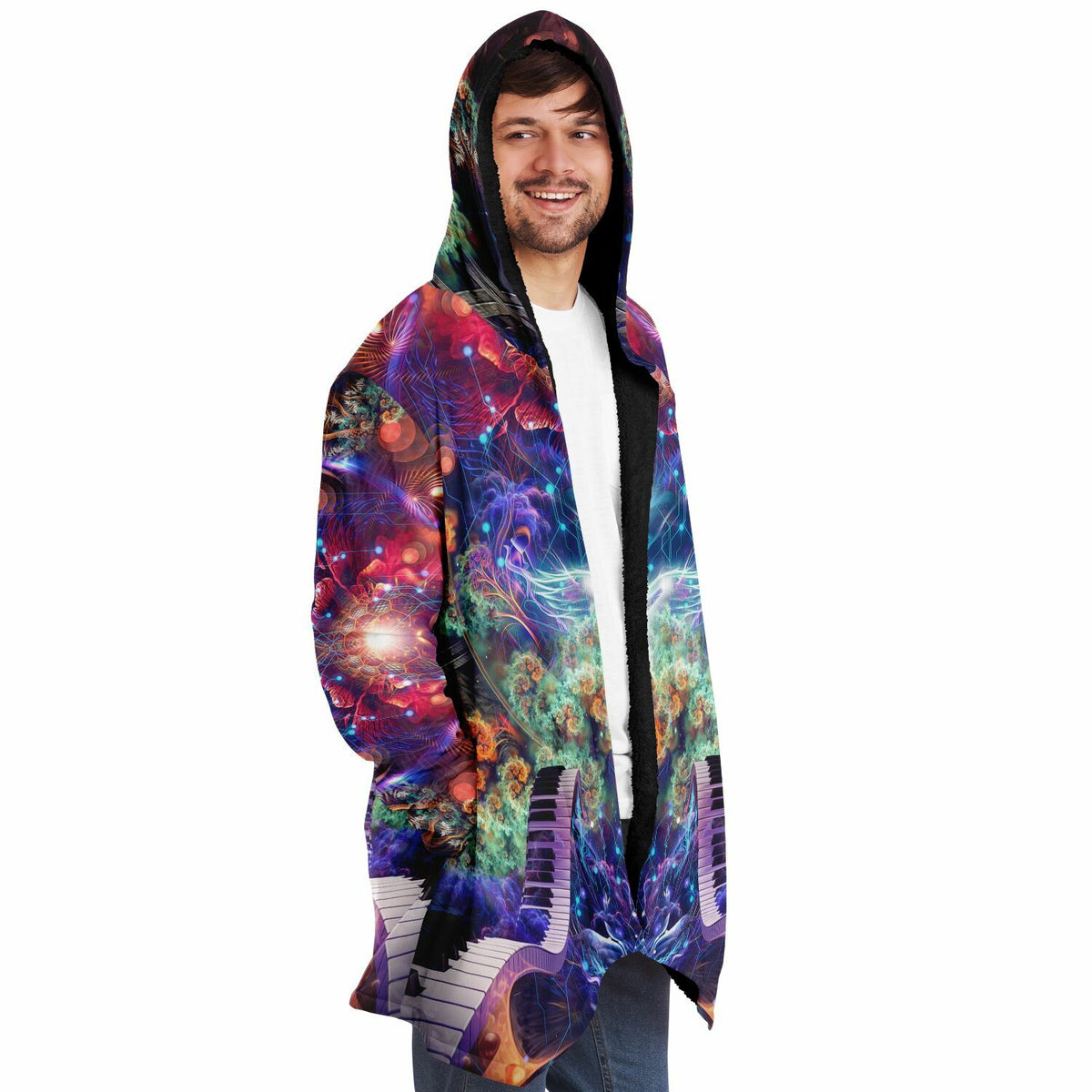 Male model wearing the "Magnus Opum" hooded cloak, side profile from the right.