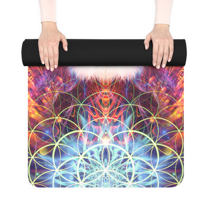 Two hands rolling up the Genesis yoga mat, revealing its black anti-slip rubber underside and a corner of colorful print.