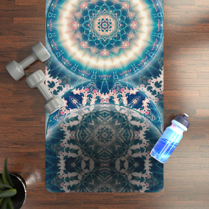 Triple Goddess yoga mat on a wood floor beside dumbbells and a water bottle, showing the blue mandala design.