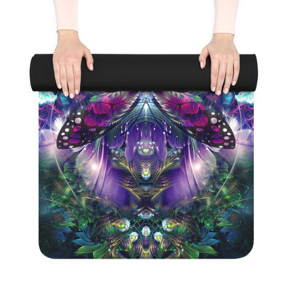 "Emergence" yoga mat rolled up and held in two hands, showing its black rubber outer surface.