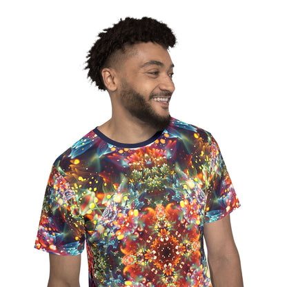 Detail of the hem and seam on the "Kaleidobloom" print men's sport tee.