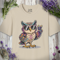 Peace Owl graphic print on a t-shirt: a cartoon owl in sunglasses flashing a peace sign, styled with lavender and sage.