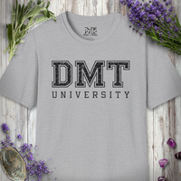 Grey heather DMT University t-shirt laid flat on wood with sage and lavender sprigs and crystals.