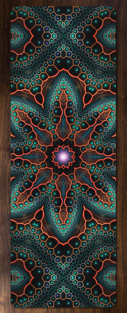 Overhead photo of the 'Multiverse' yoga mat laid flat on a wood floor.