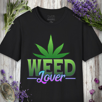 Weed Lover t-shirt with a green cannabis leaf and green-pink 'Weed Lover' text, flat lay styled with lavender.