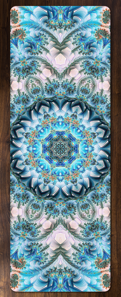 Return to Purity yoga mat laid flat on a wood floor, showing the full blue and white sacred geometry mandala print.
