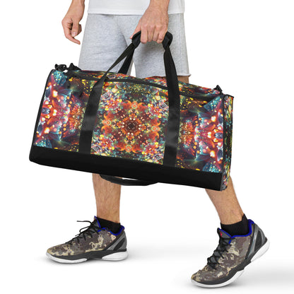 Front view of the Kaleidobloom duffle bag with both padded handles joined at the top.