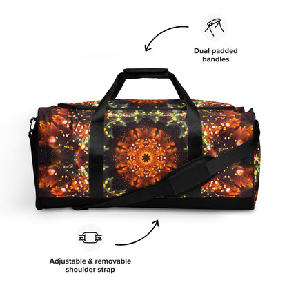 White duffle bag printed with the "Autumn Bloom" design, front view showing the zip pocket and handles.