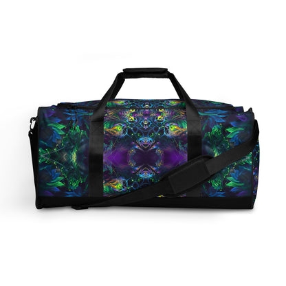 White duffle bag printed with the "Awakened" design, front view showing the zip pocket and handles.
