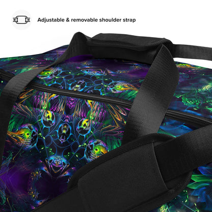 Close-up detail of the "Awakened" print on the white duffle bag fabric.