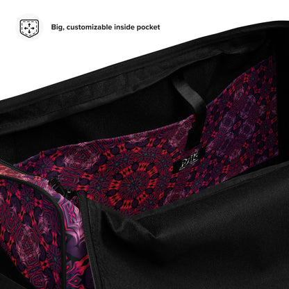 Close-up of the padded shoulder strap on the 'Forged In Neon' duffle bag.
