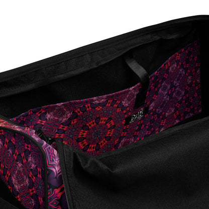 Close-up of the dual padded carry handles on the 'Forged In Neon' duffle bag.