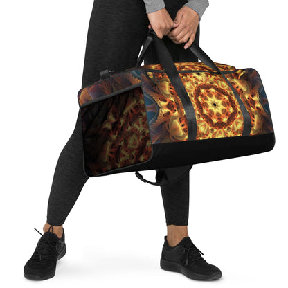 Angled view of the Totem Sun duffle bag showing the T-piping seam along the printed fabric.