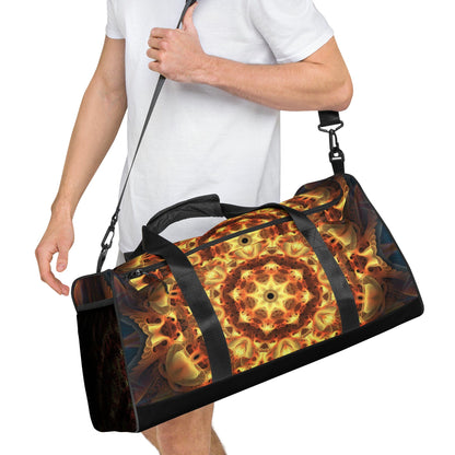 Straight-on angled shot of the Totem Sun duffle bag with the adjustable padded shoulder strap draped over the top.