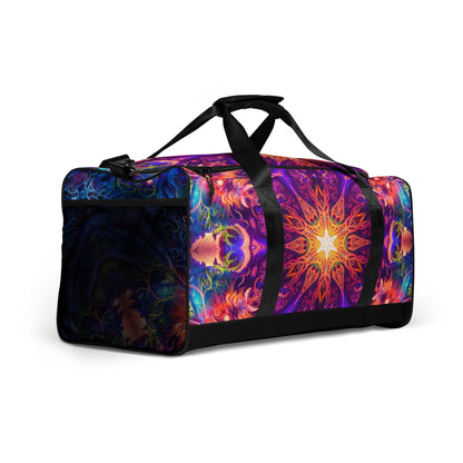 Angled right-front view of the Sacred Circle duffle bag showing the full cosmic print across the panel.