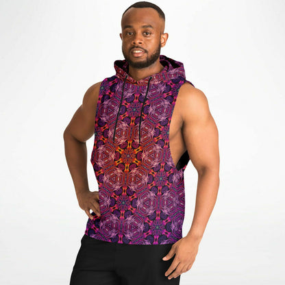 A second model wearing the “Forged In Neon” sleeveless hoodie from the side, showing the drop armhole cut.