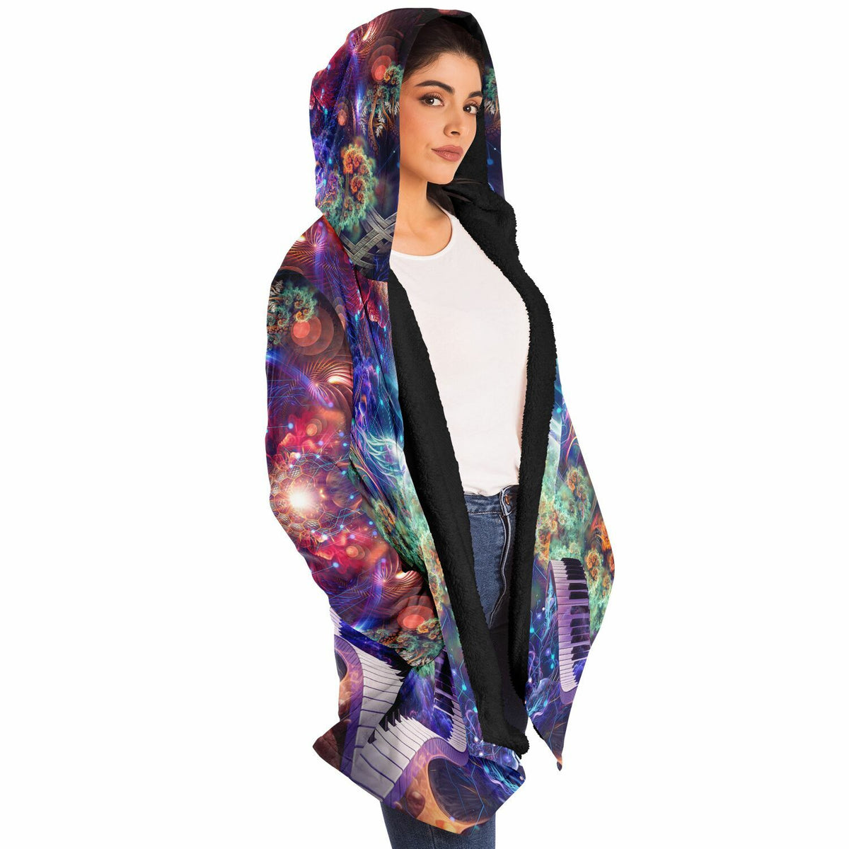 Female model wearing the "Magnus Opum" hooded cloak, side profile from the right.